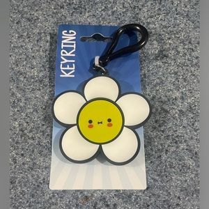 Happy cute flower key ring. White black and yellow. For adults and or kids